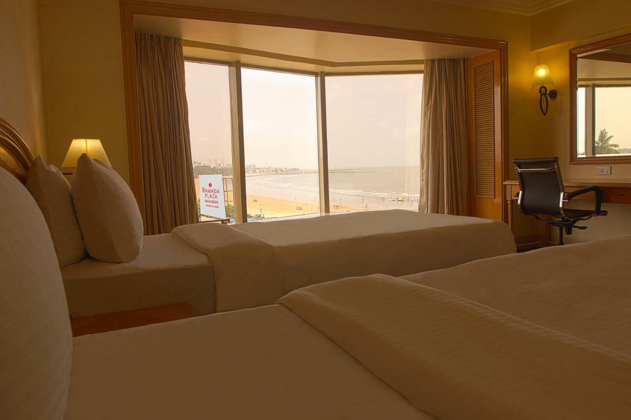 Ramada Plaza By Wyndham Palm Grove Hotel Mumbai Kültér fotó A room at the hotel